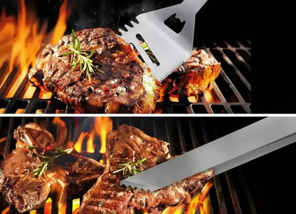 stainless steel barbecue spatula and heavy duty grill tongs being used to cook steaks on outdoor grill