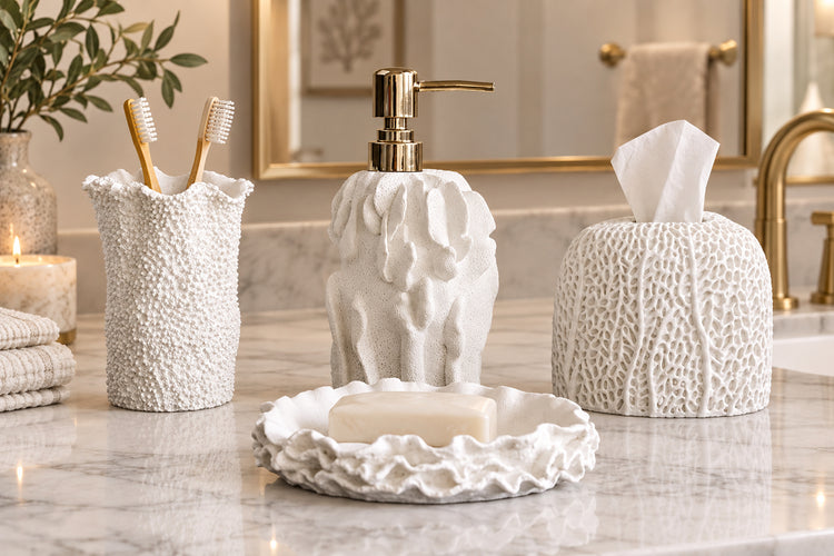 White textured bathroom accessories set with soap dispenser, toothbrush holder, tumbler, and soap dish with coral style surface