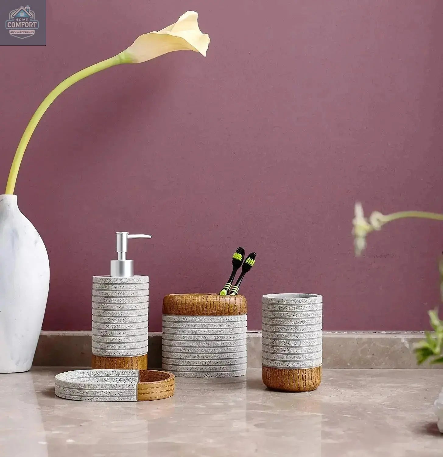 Gray and wood bathroom accessories set with soap dispenser, toothbrush holder, tumbler, and soap dish on bathroom counter
