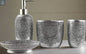 Decorative silver patterned bathroom accessories set with soap dispenser, tumbler, toothbrush holder, and soap dish