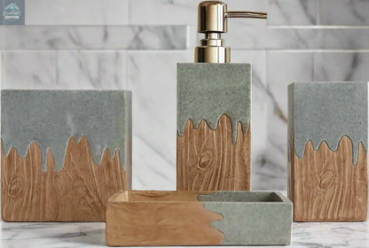 Gray and wood bathroom accessories set styled on bathroom counter with decorative plant and soap dispenser