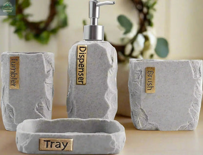 Gray stone bathroom accessories set with soap dispenser, toothbrush holder, tumbler, and tray with labeled pieces on countertop