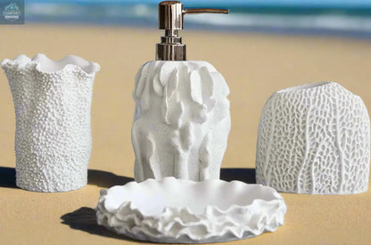 White textured bathroom accessories set with soap dispenser, toothbrush holder, tumbler, and soap dish with coral style surface