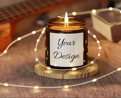 Amber Soy Candle 4 oz in a jar with 'Your Design' label on a wooden coaster surrounded by string lights, with a guitar in the background.