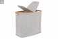Grey bamboo canvas laundry hamper with lid open showing modern freestanding laundry basket for bedroom or bathroom organization
