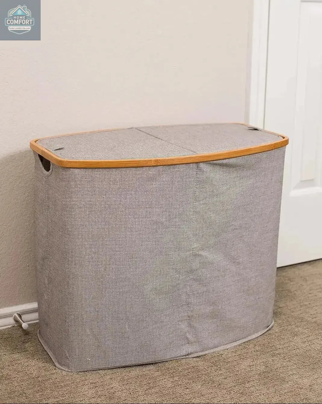 Grey bamboo canvas laundry hamper with lid closed placed in bedroom corner showing compact laundry storage solution
