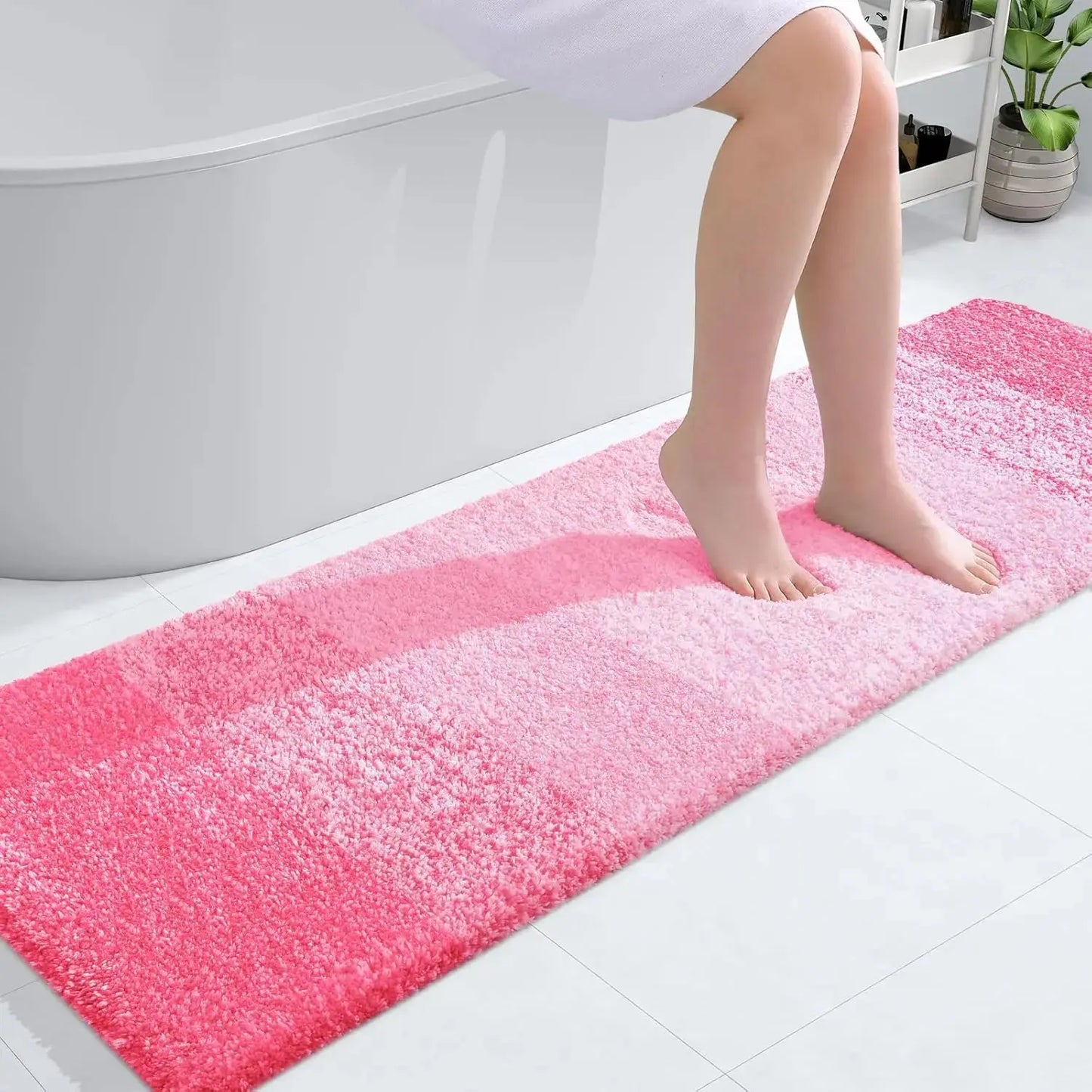Pink extra soft microfiber bath mat with non slip backing and absorbent surface 59x17 inch