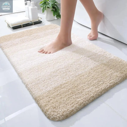 Light beige extra soft microfiber bath mat with non slip backing and absorbent surface size 24x16 inch