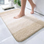 Light beige extra soft microfiber bath mat with non slip backing and absorbent surface size 24x16 inch