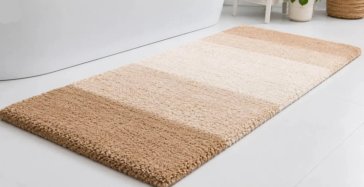 Beige and brown gradient rug on a white floor
