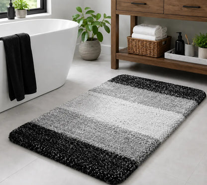 Black extra soft microfiber bath mat with non slip backing and absorbent surface 