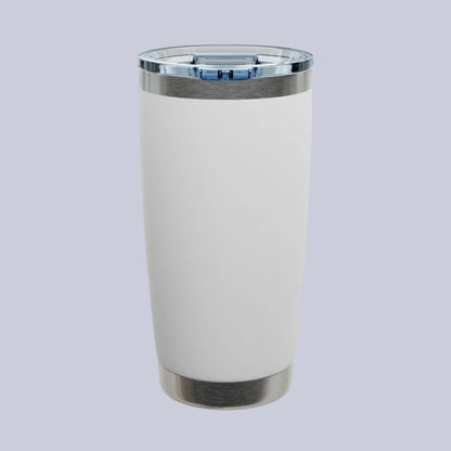 A matte white insulated travel tumbler with brushed stainless steel accents at the top and bottom, featuring a clear lid. A small Comfort Colors logo badge is visible in the top-left corner.