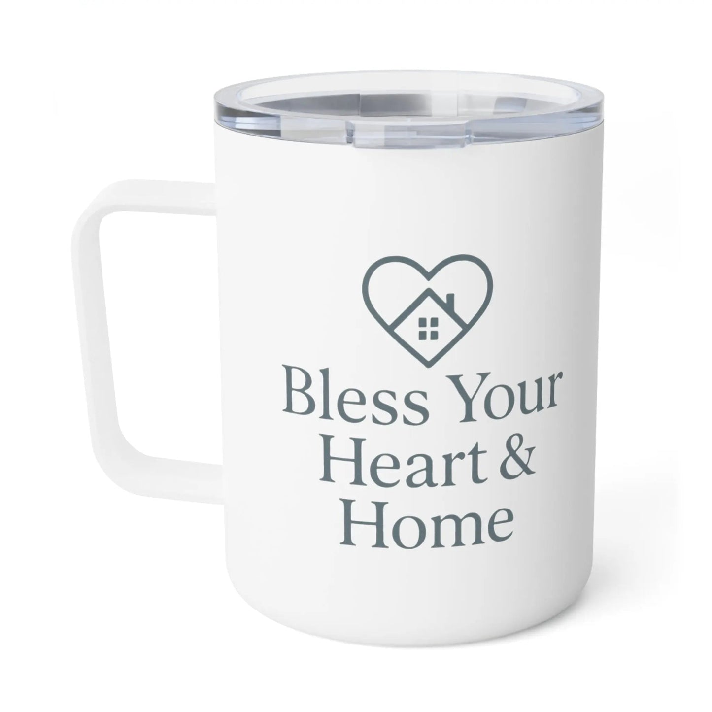 A white insulated travel mug with a clear lid, featuring a dark gray printed heart-with-house icon and the text 'Bless Your Heart & Home' on the front.