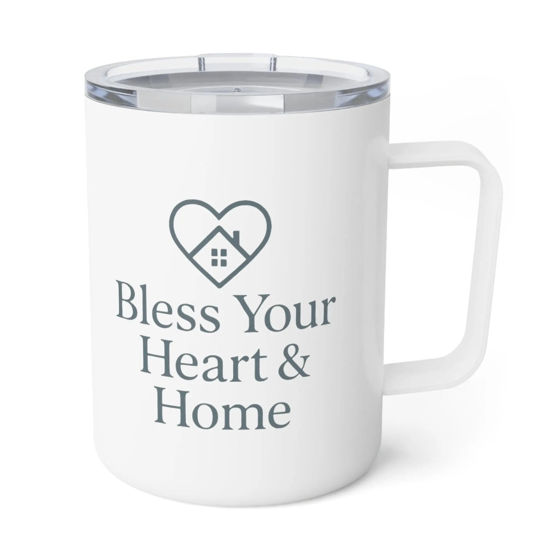 A white insulated travel mug with a clear lid, featuring a dark gray printed heart-shaped house icon and the text 'Bless Your Heart & Home' on the front. A small 'Comfort Colors' logo is visible in the top-left corner.