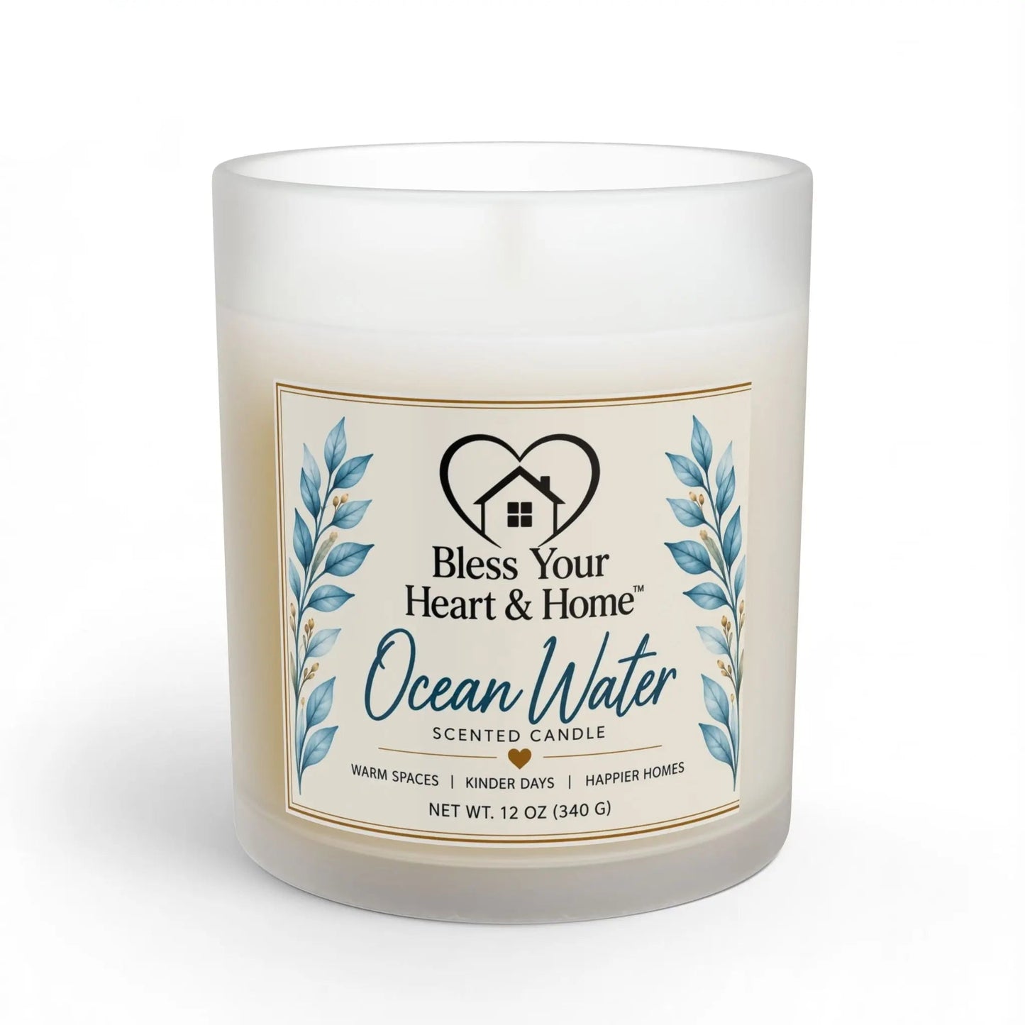 A frosted glass jar candle with a cream-colored wax and a decorative front label reading 'Ocean Water Scented Candle' by Bless Your Heart & Home, shown on a white background.
