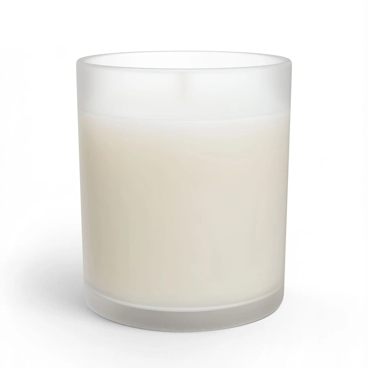 A frosted glass jar candle with creamy off-white wax, shown on a clean white background.