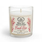 A 11 oz scented candle in a clear glass jar with a white wax fill and a cream-colored label. The label features pink rose illustrations and the brand name 'Bless Your Heart & Home' with the scent name 'Beach Rose'.