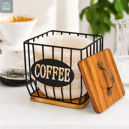 Coffee filter holder and capsule basket with wood lid displayed on coffee bar beside pour over coffee maker