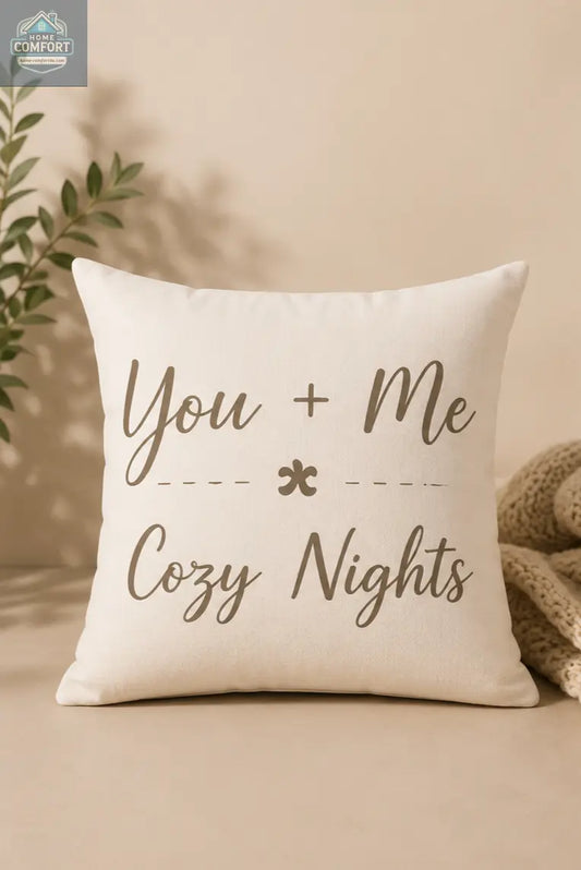 Cozy Nights Square Throw Pillow with 'You + Me Cozy Nights' text on a beige background