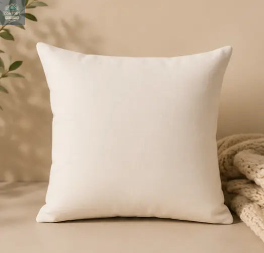 Cozy Nights Square Throw Pillow on a beige background with a textured blanket and plant leaves.