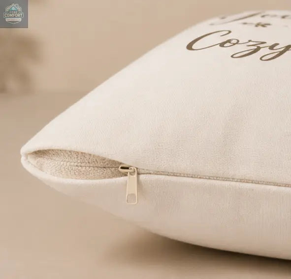 Cozy Nights Square Throw Pillow  with 'Cozy' text on a beige background