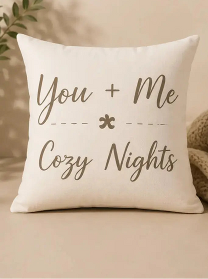 Cozy Nights Square Throw Pillow with 'You + Me Cozy Nights' text on a beige background