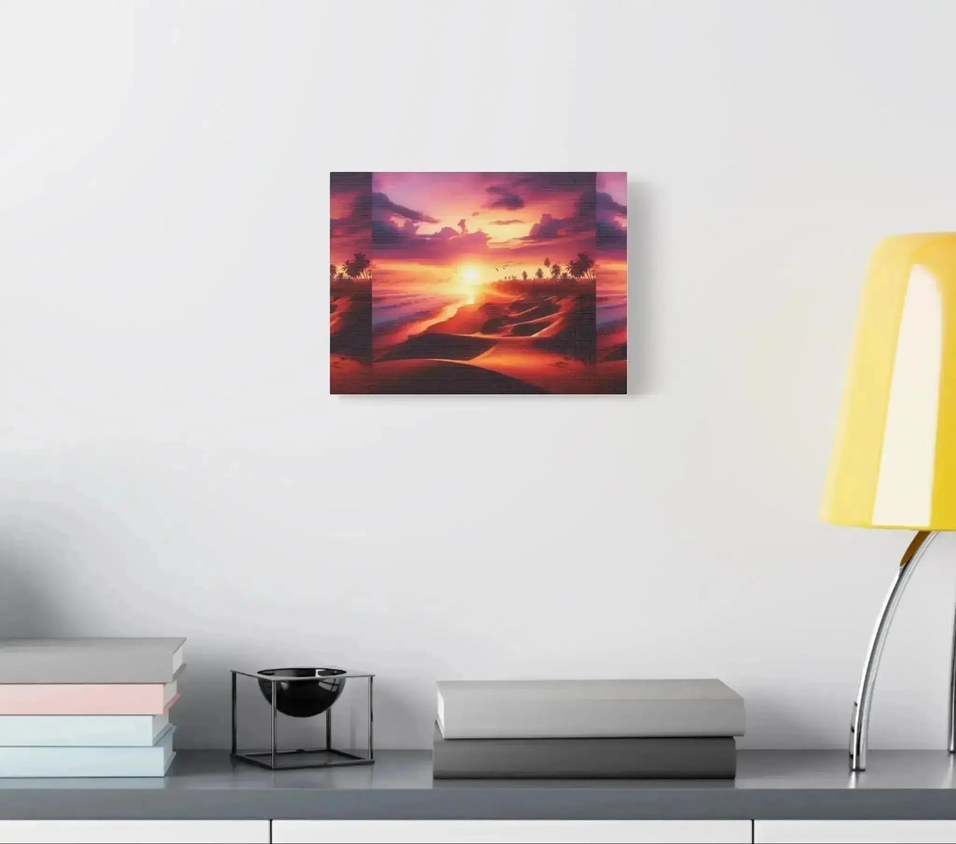 Custom tropical sunset canvas print displayed on a modern wall above a desk with books and lamp