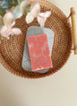 Quick-drying diatomite soap dish holding bar soap in decorative bathroom display