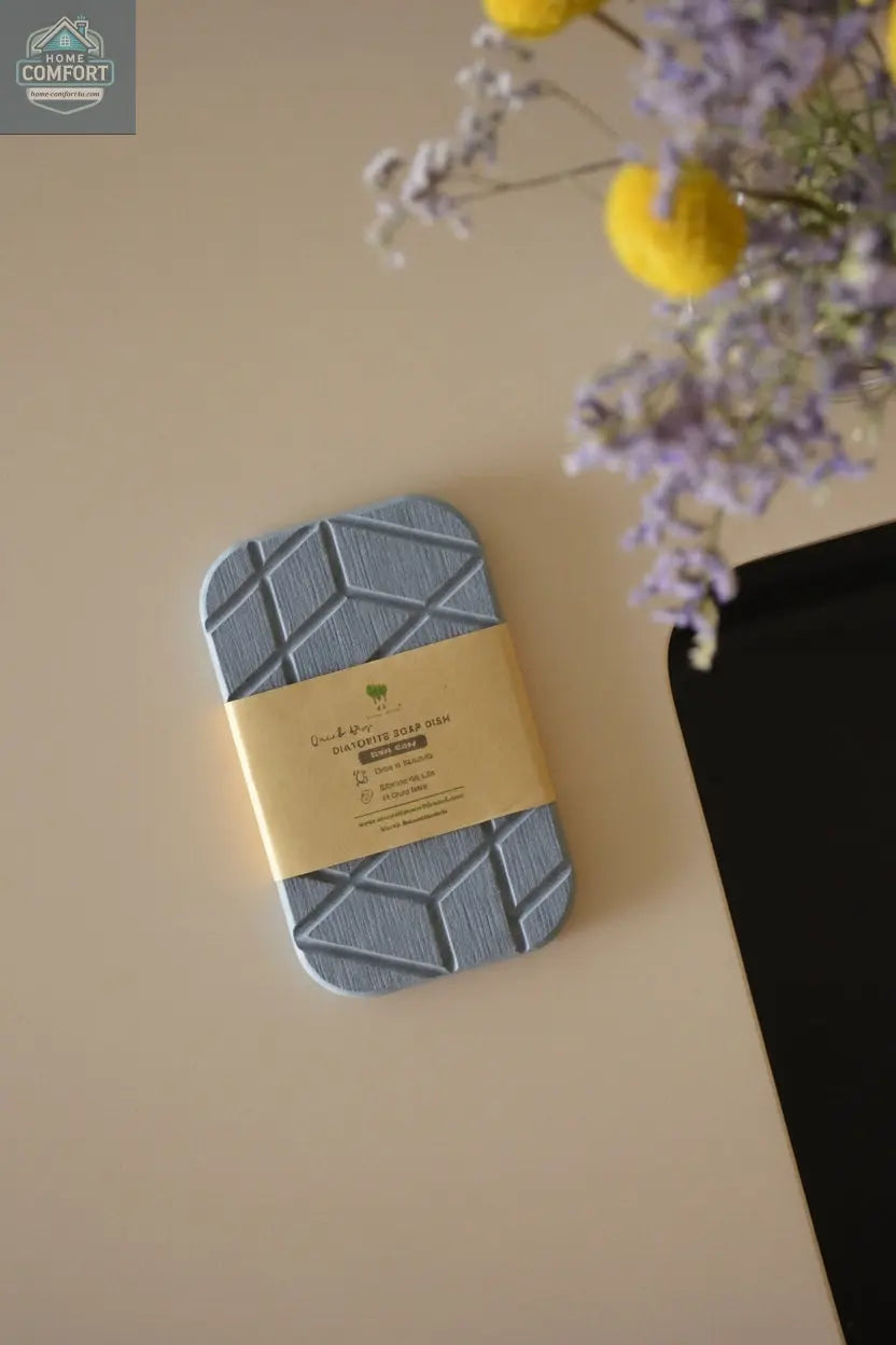 Geometric quick-dry diatomite soap dish displayed with kraft packaging on countertop