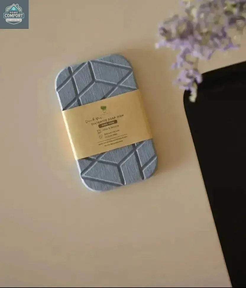 Geometric quick-dry diatomite soap dish displayed with kraft packaging on countertop