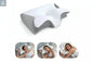 Contoured memory foam cervical pillow showing ergonomic shape and support for back and side sleeping