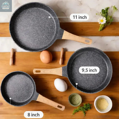 Flat lay showing three sizes of nonstick frying pans including 8 inch 9.5 inch and 11 inch cookware
