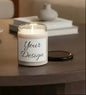 Personalized 9oz soy candle with custom label in reusable glass jar styled on a shelf for home décor