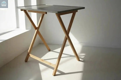 Rustic XL folding tray table standing near window in natural light
