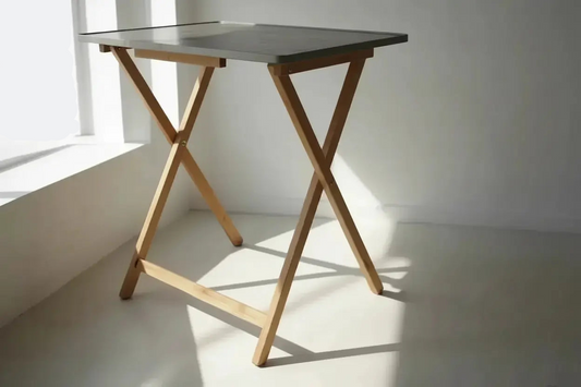 Rustic XL folding tray table standing near window in natural light
