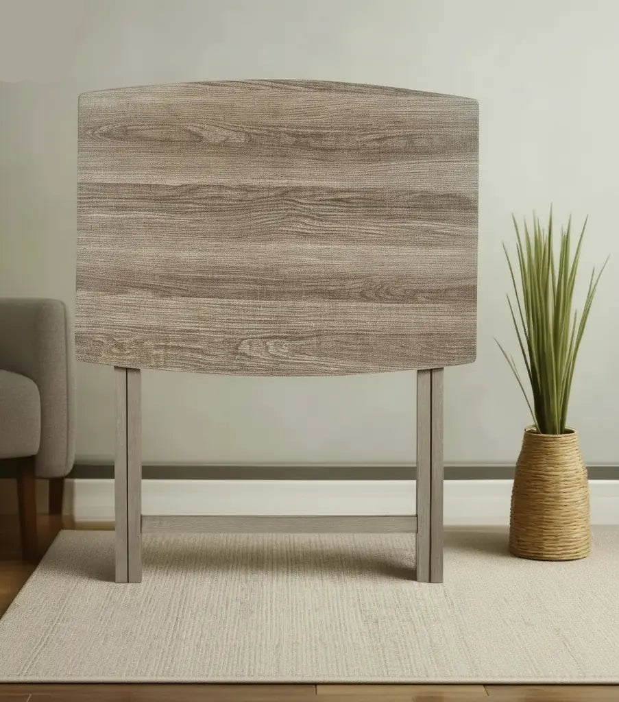 Rustic XL folding tray table folded upright against wall