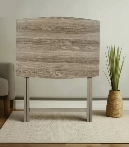 Rustic XL folding tray table folded upright against wall