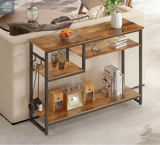 Rustic wood and metal entryway console table placed behind sofa in living room
