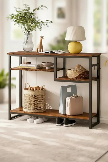 Rustic wood and metal entryway console table with storage shelves styled in home entryway
