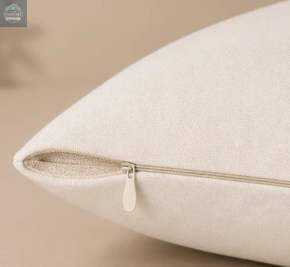 Close-up of a beige pillow Together Is Our Favorite Place - Decorative Throw Pillow  with a zipper on a beige background