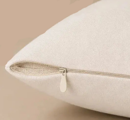 Close-up of a beige pillow Together Is Our Favorite Place - Decorative Throw Pillow  with a zipper on a beige background