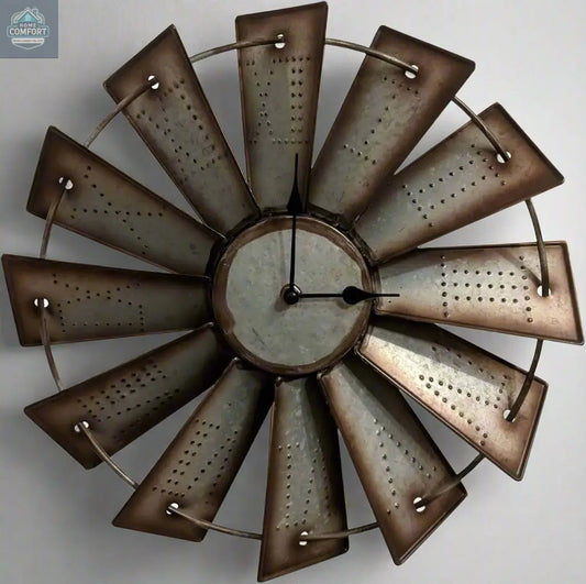 Antique metal windmill wall clock with distressed blades and Roman numeral style center, rustic farmhouse wall decor